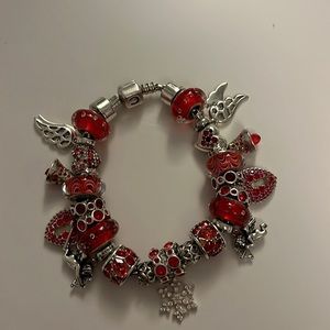 Stunning Chamilia bracelet with 27 Chamilia charms